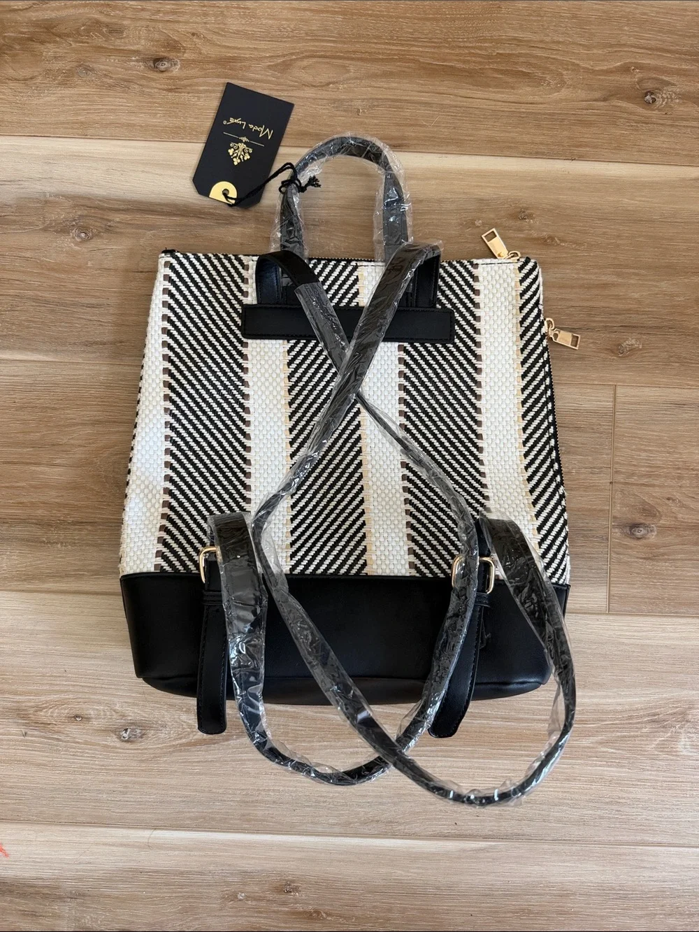 Moda Luxe Women’s Black and Cream Striped Backpack Bag